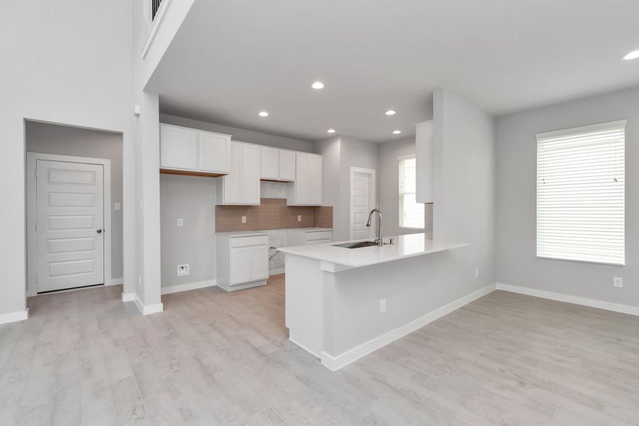 Sample photo of completed home with similar floor plan. Actual colors and selections may vary.