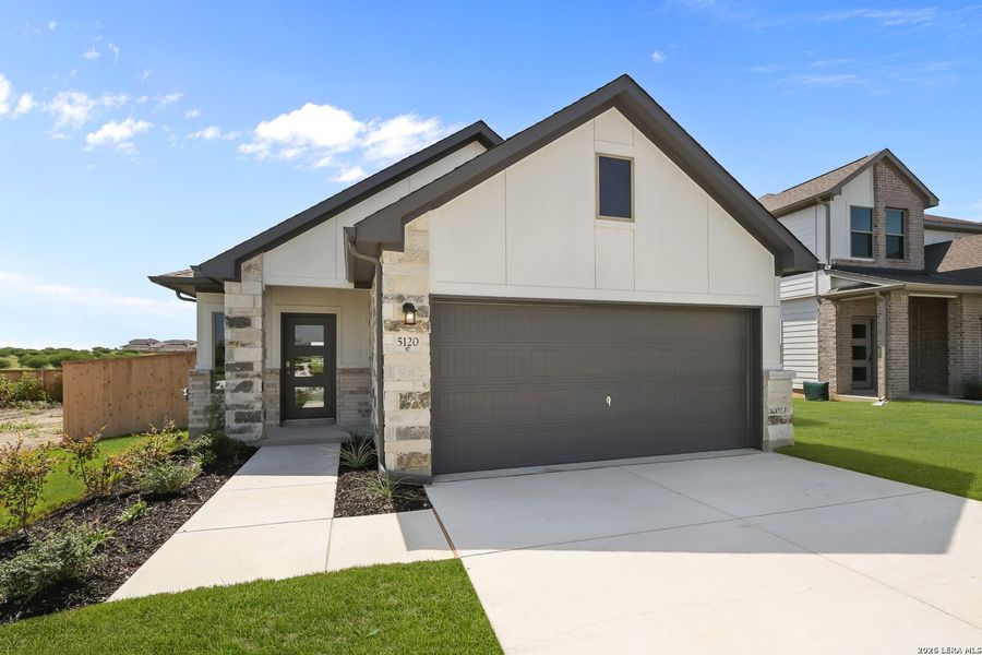Front exterior of a new home in The Parklands, Schertz, TX, highlighting curb appeal (Image 23).