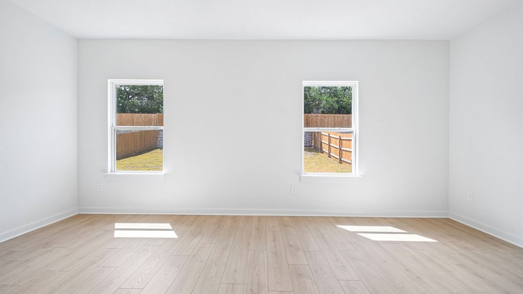 Spacious, unfurnished interior of a new home in Rosenbusch Ranch, Leander (Image 22).