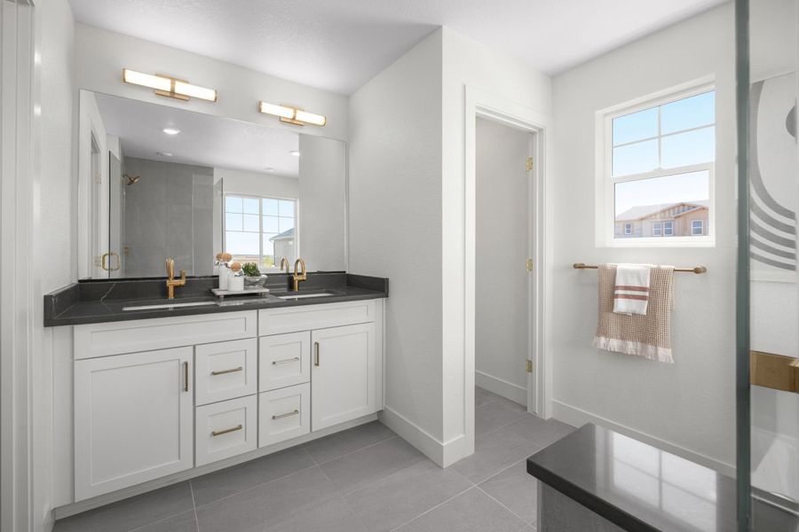 Dual-sink vanity at primary bath