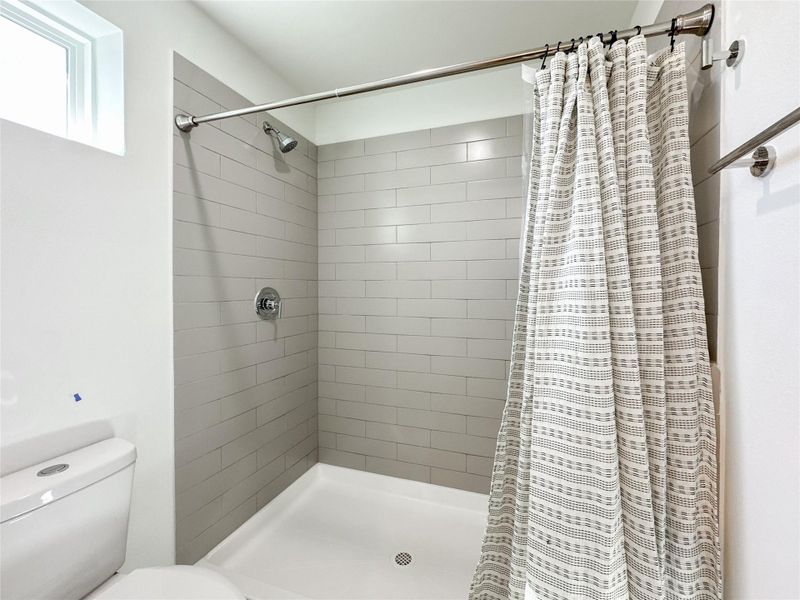 Furnished interior view inside a new home in , Conroe (Image 32).