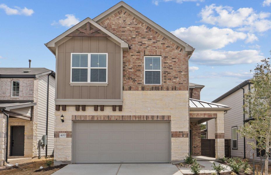 Front exterior of a new home in Horizon Lake, Leander, TX, highlighting curb appeal (Image 1). Front exterior of a new home in Horizon Lake, Leander, TX, highlighting curb appeal (Image 1).