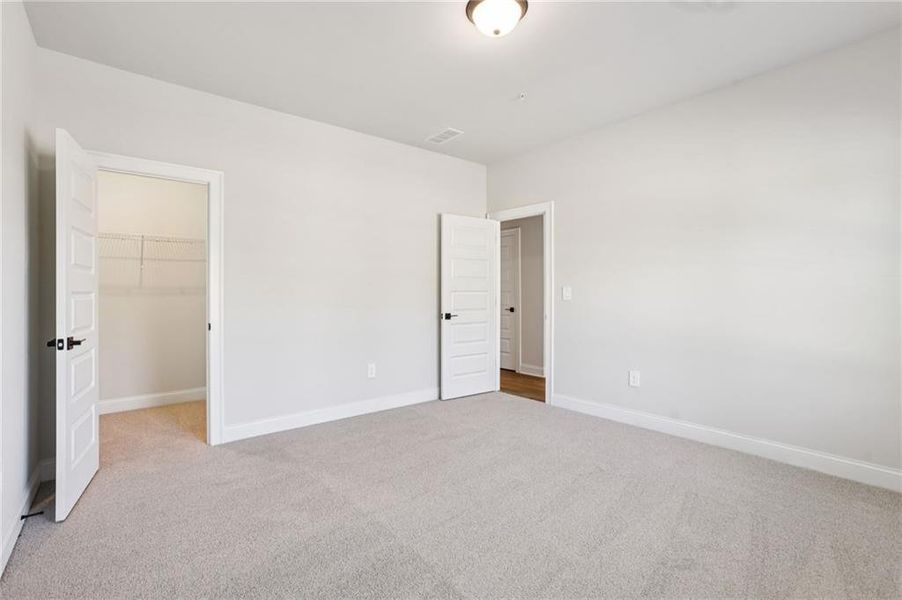 Spacious, unfurnished interior of a new home in Hemingway - Highland Series, Cumming (Image 19). Spacious, unfurnished interior of a new home in Hemingway - Highland Series, Cumming (Image 19).