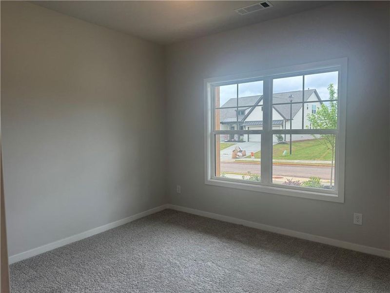 Spacious, unfurnished interior of a new home in Rosewood Lake Preserve, Hoschton (Image 37).