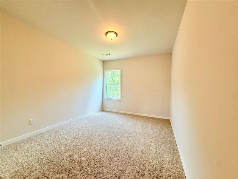 Spacious, unfurnished interior of a new home in Ponderosa Farms Reserve, Gainesville (Image 40).