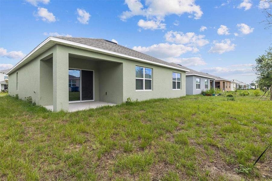 Exterior details and patio area of a home in Cypress Park Estates, Haines City (Image 3).