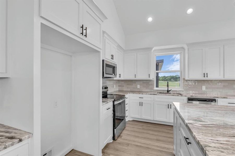 Furnished interior view inside a new home in , Elm Mott (Image 13).