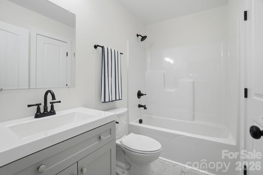 Furnished interior view inside a new home in , Newton (Image 9).