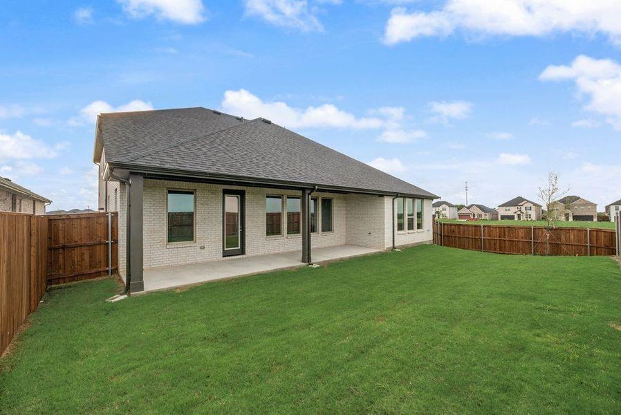 Exterior details and patio area of a home in Sutton Fields, Celina (Image 23).