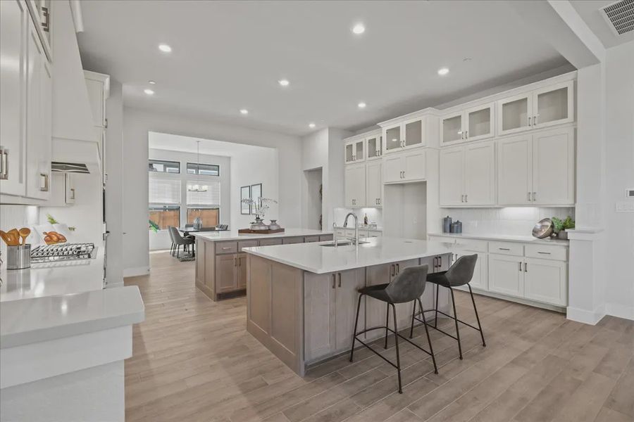 Representative furnished interior of a home built from the Bradley by Chesmar Homes in Sweetwater, Austin (Image 11).