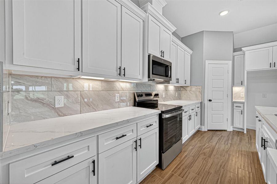 Furnished interior view inside a new home in , Prairie View (Image 9).