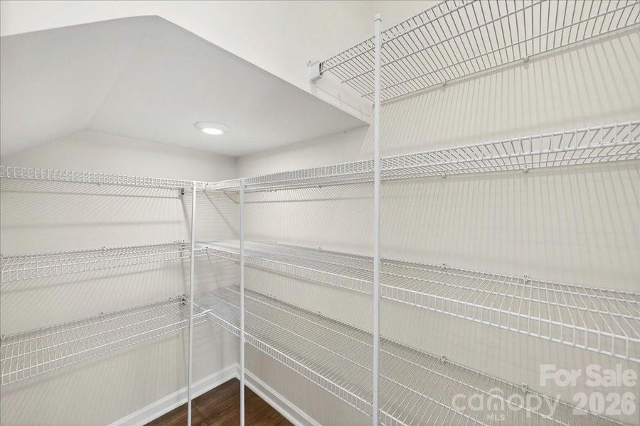 Large walk-in closet Large walk-in closet