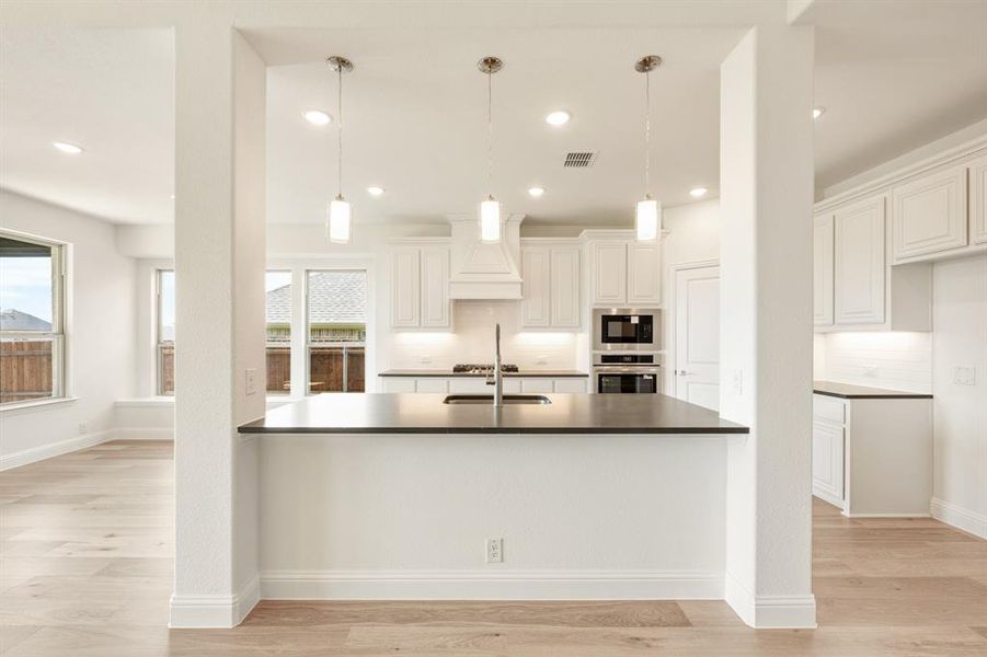 Furnished interior view inside a new home in Country Lakes, Denton (Image 10).