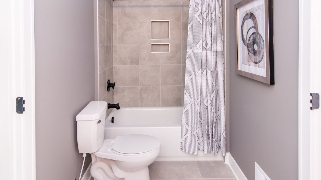 Representative furnished interior of a home built from the The Chesterfield by Norfolk Homes in Valleys, Jackson (Image 57).