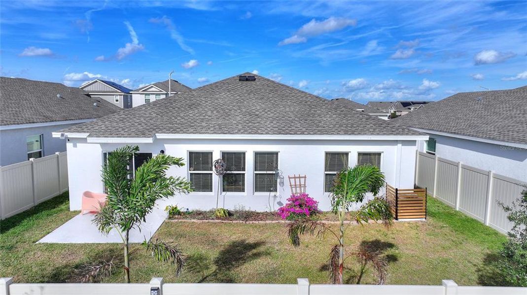 Exterior details and patio area of a home in Lawson Dunes: Estate Collection, Haines City (Image 4).