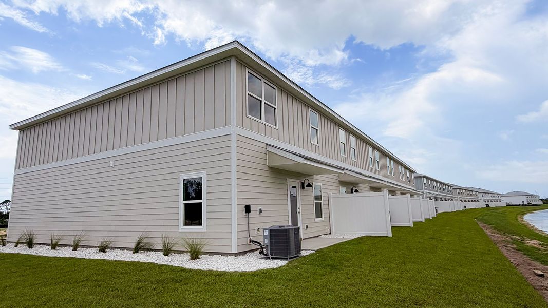 Exterior details and patio area of a home in WindMark Beach, Port Saint Joe (Image 3).