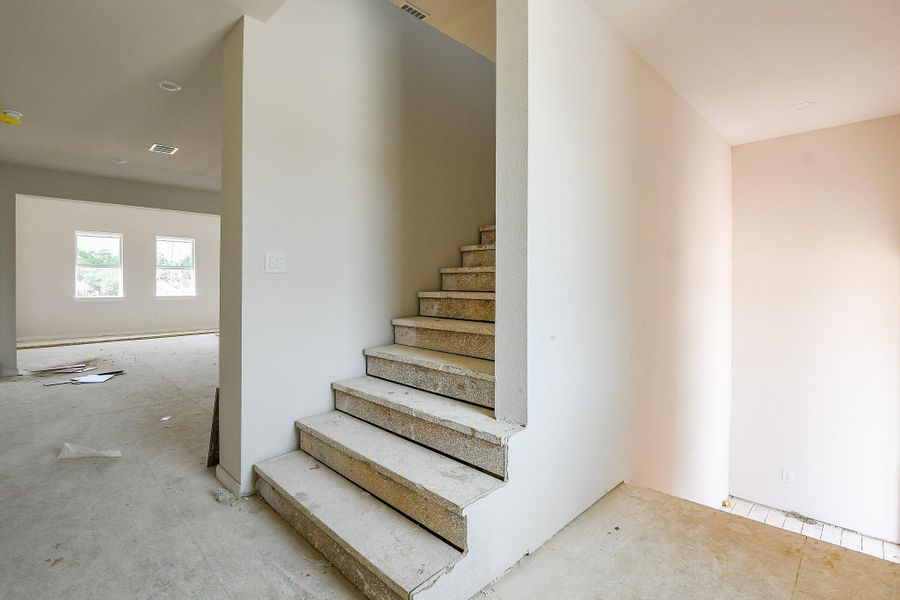 The gorgeous staircase that ascends to the upper level. The gorgeous staircase that ascends to the upper level.