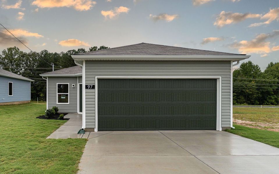 Front exterior of a new home in Stonehenge, Manchester, TN, highlighting curb appeal (Image 2). Front exterior of a new home in Stonehenge, Manchester, TN, highlighting curb appeal (Image 2).