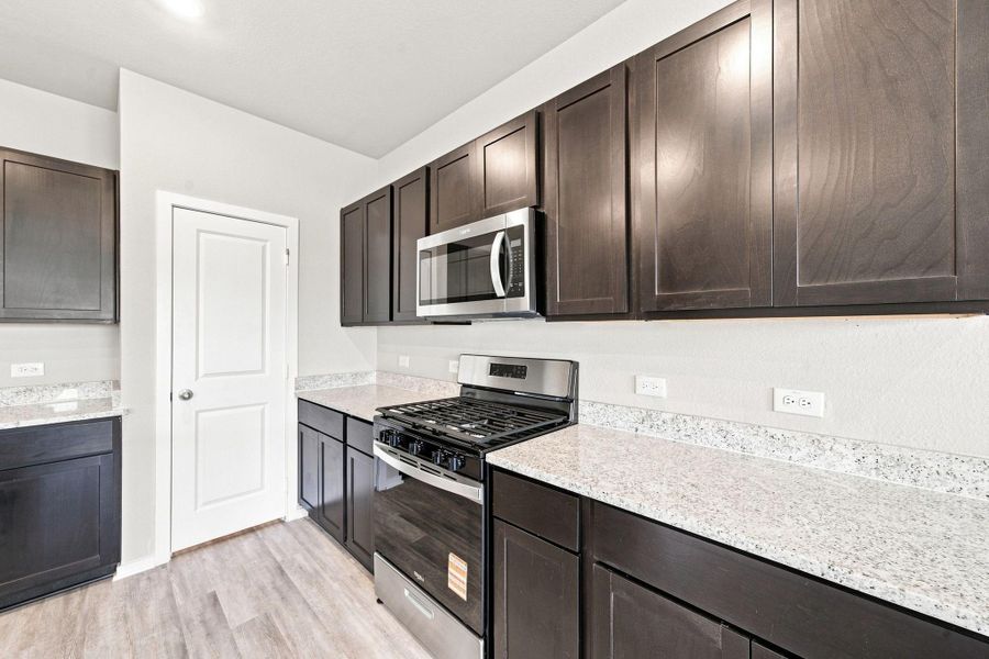 Furnished interior view inside a new home in Windcress, Cove (Image 5).