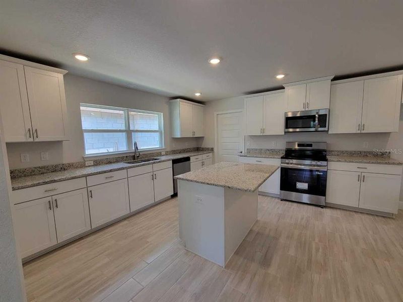 Furnished interior view inside a new home in , Ocala (Image 6).