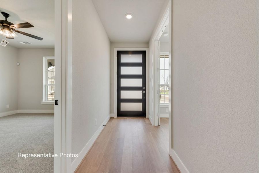 Representative unfurnished interior of a home built from the Royal Catherine IV by Grand Homes in Edgewater, Fate (Image 12).