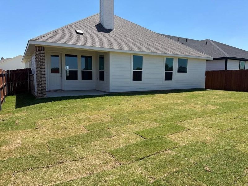 Exterior details and patio area of a home in Covenant Park, Springtown (Image 3).