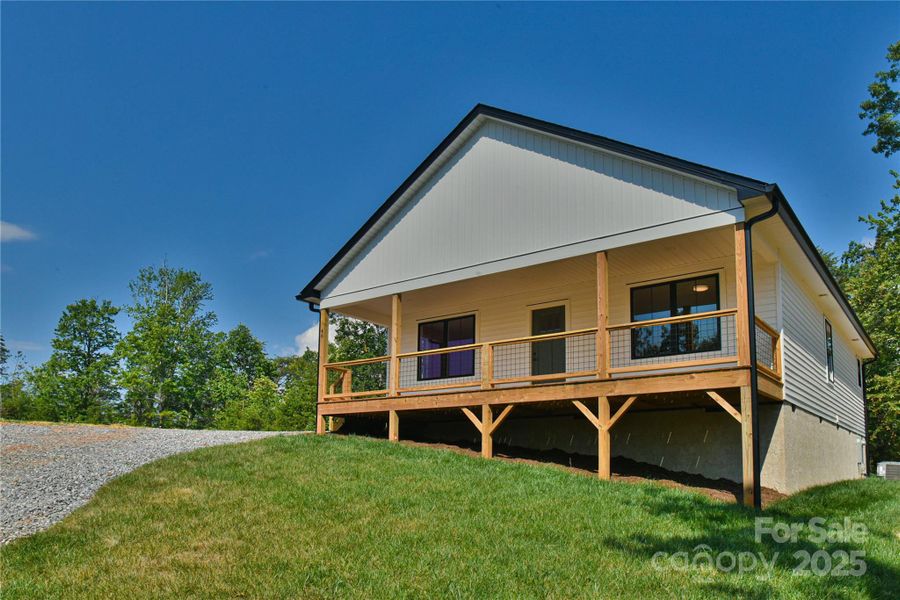 Front exterior of a new home in , Old Fort, NC, highlighting curb appeal (Image 2).
