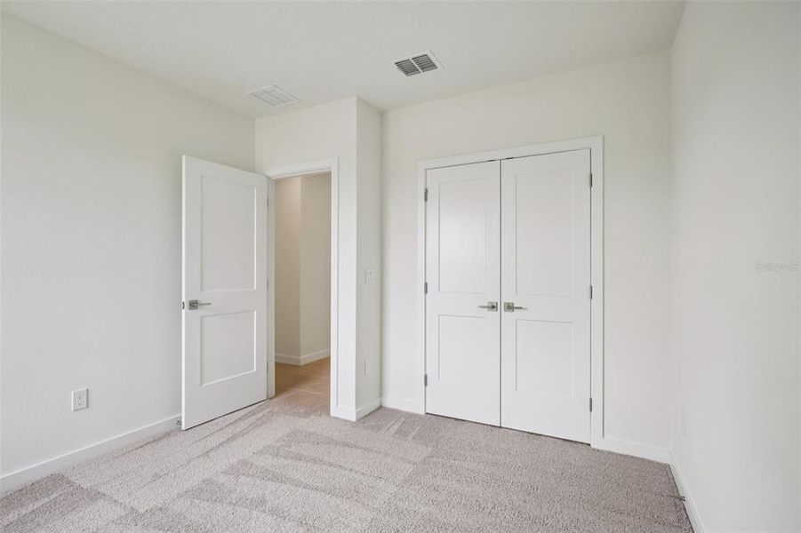 Spacious, unfurnished interior of a new home in Grasslands West, Lakeland (Image 17).