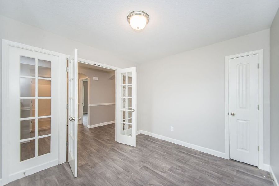 Representative unfurnished interior of a home built from the Beaumont by Enchanted Homes in Guadalupe Heights, Seguin (Image 24).