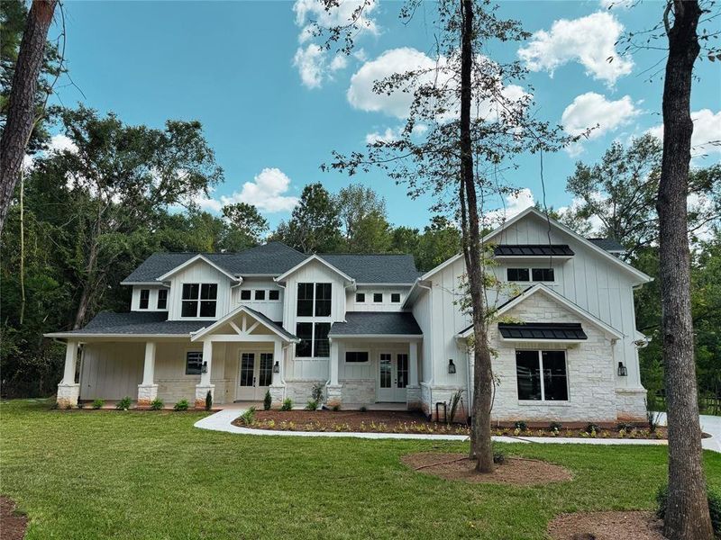 Front exterior of a new home in , Pearland, TX, highlighting curb appeal (Image 2).