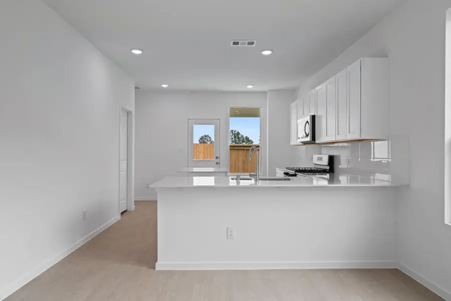 Furnished interior view inside a new home in Montgomery Bend, Montgomery (Image 6).