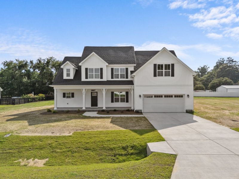 Front exterior of a home in the Kennedy's Crossing community, located in Grimesland, NC (Image 8).