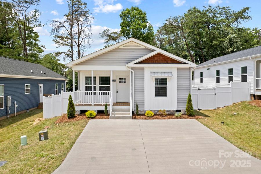 Front exterior of a new home in , Asheville, NC, highlighting curb appeal (Image 19).