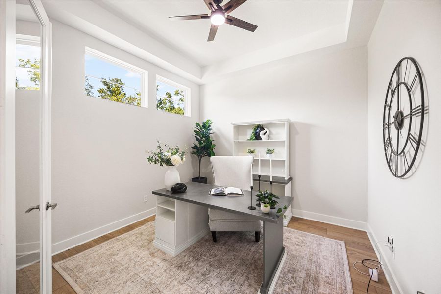 The private home office is filled with natural light, creating a bright and quiet workspace ideal for working from home or studying.