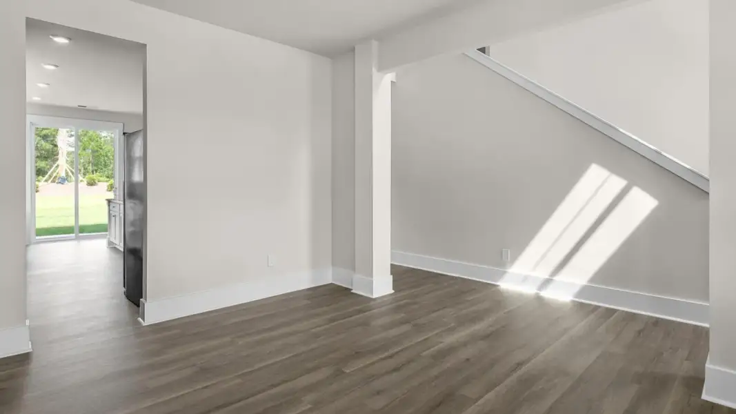 Representative unfurnished interior of a home built from the Forrester by D.R. Horton in The Highlands at Cedar Hill Landing, Navassa (Image 17).