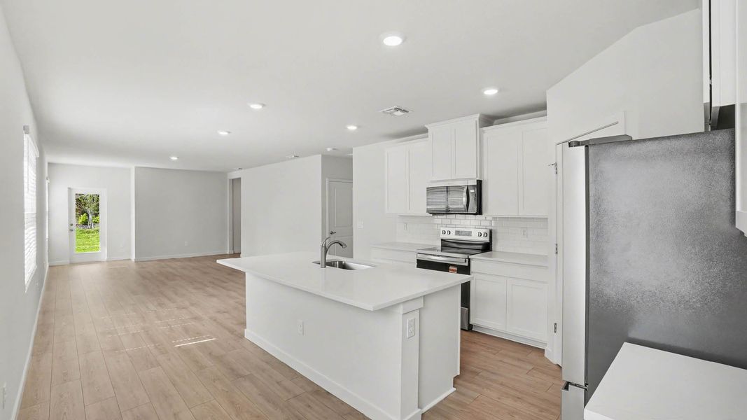 Furnished interior view inside a new home in Venetian Grove, Vero Beach (Image 7).