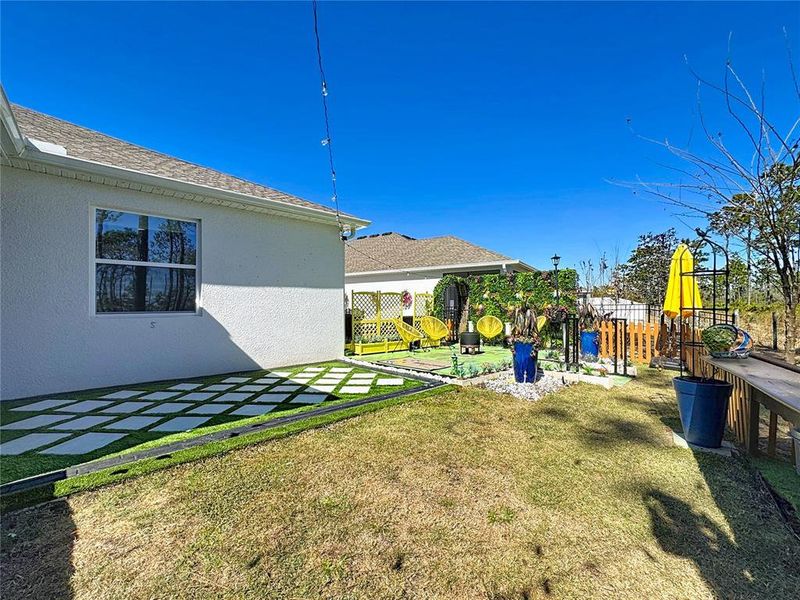 Exterior details and patio area of a home in Bridgewalk, St. Cloud (Image 27).