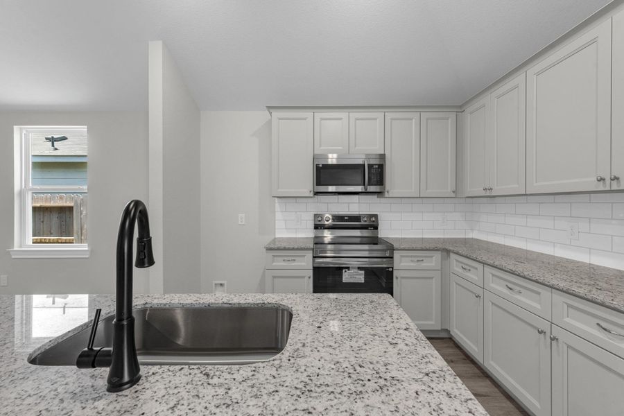Furnished interior view inside a new home in The Enclave at Spring Branch, Conroe (Image 7).