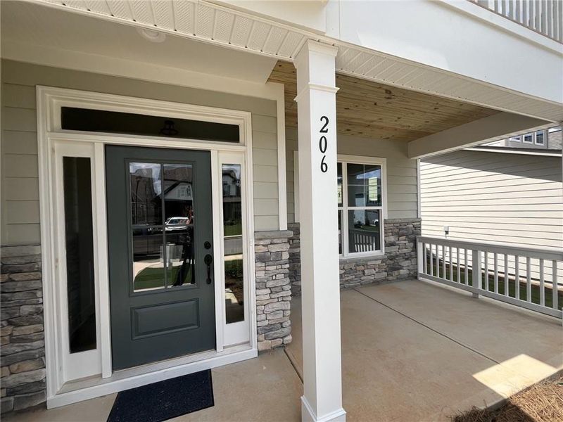 Exterior details and patio area of a home in Twin Lakes, Hoschton (Image 20).
