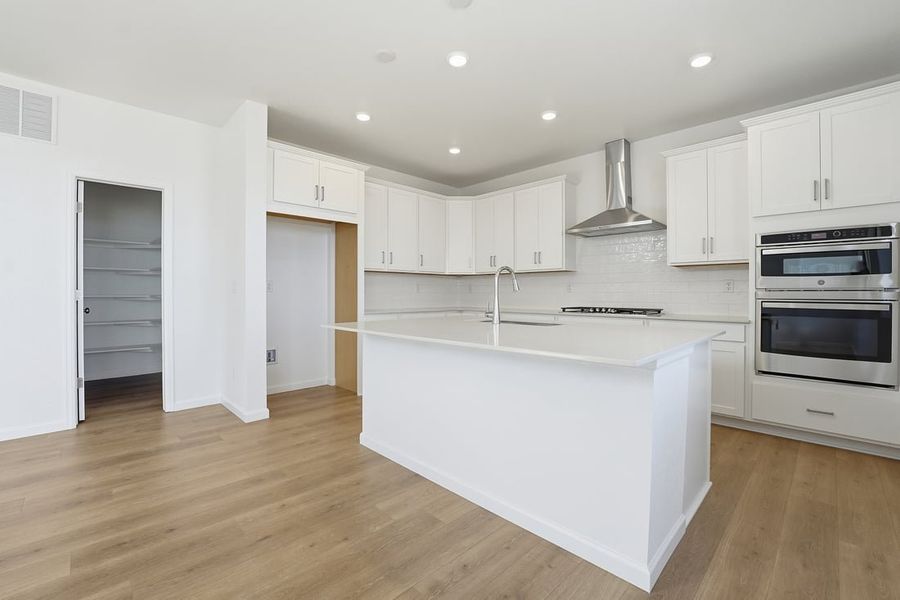 Furnished interior view inside a new home in Trailstone, Arvada (Image 5).
