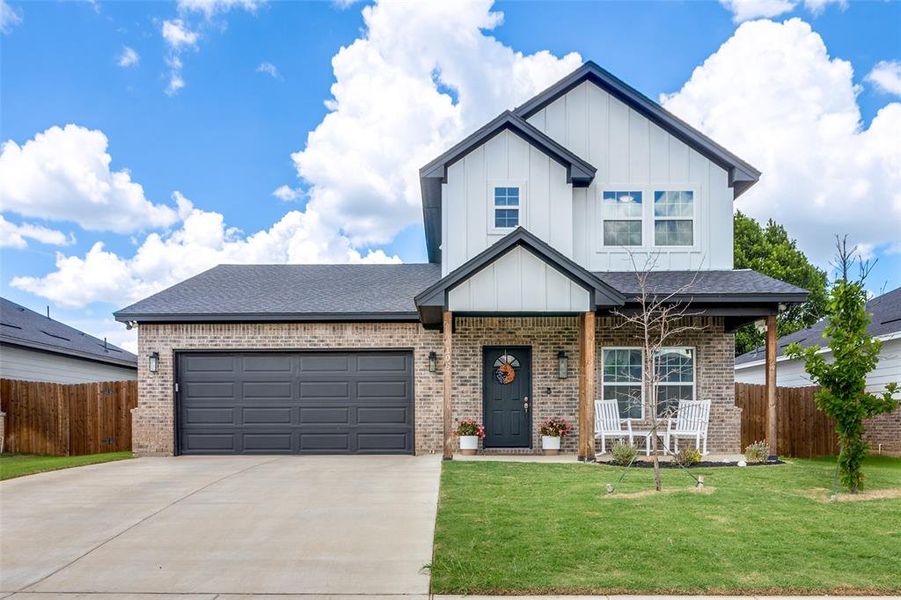 Front exterior of a home in the Magnolia Estates community, located in Crowley, TX (Image 3).