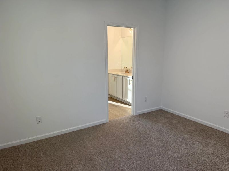 Primary Bed featuring the AW Collection® Serene - A tranquil retreat in soft, neutral textures.