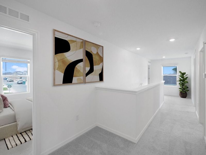 Representative furnished interior of a home built from the Azalea by Taylor Morrison in Palm Wind, Hudson (Image 27).