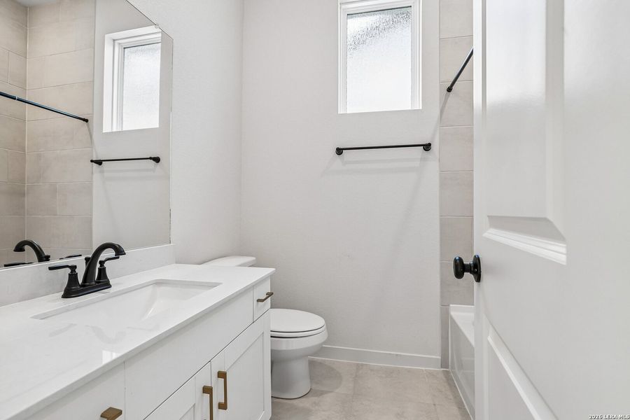 Furnished interior view inside a new home in Stream Waters, Seguin (Image 8).