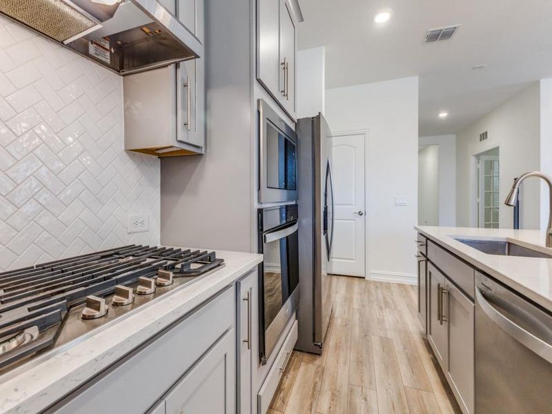 Furnished interior view inside a new home in Woodcreek, Fate (Image 7).