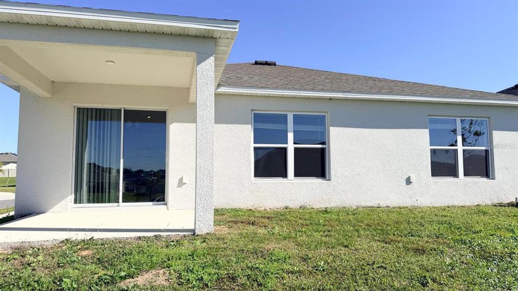 Exterior details and patio area of a home in Lake Lucerne, Winter Haven (Image 4).