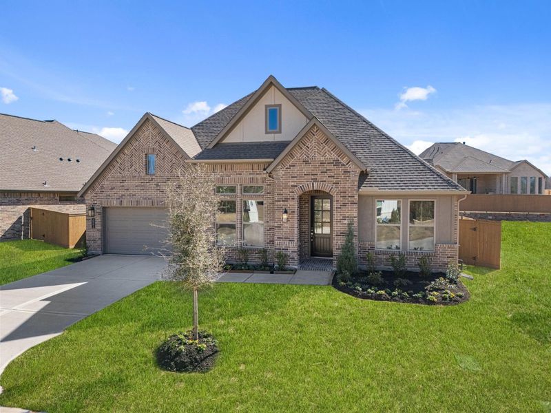 Front exterior of a new home in Chambers Creek, Willis, TX, highlighting curb appeal (Image 23).