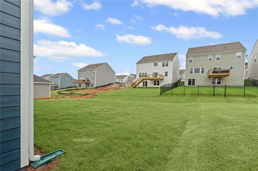 Front exterior of a new home in Twin Lakes, Hoschton, GA, highlighting curb appeal (Image 25).