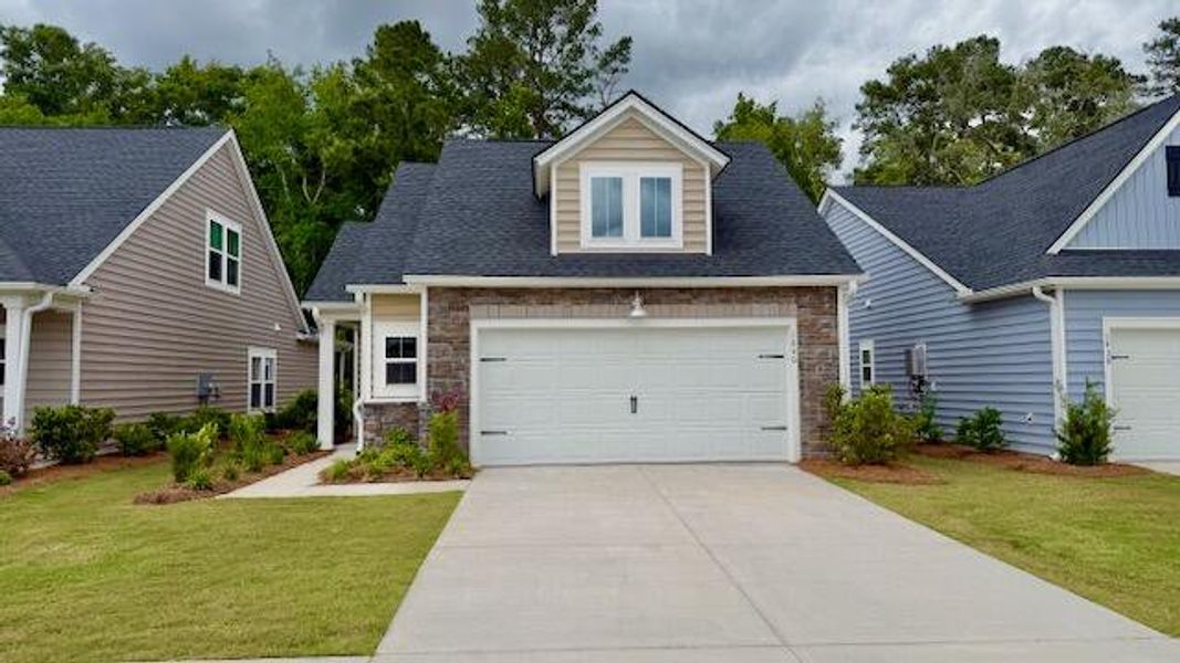 Front exterior of a new home in Horizons at Summers Corner | 55+, Summerville, SC, highlighting curb appeal (Image 17).