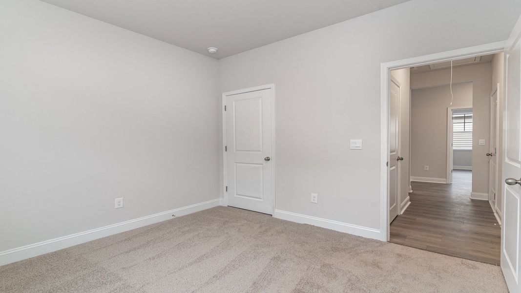 Representative unfurnished interior of a home built from the DARBY by D.R. Horton in Spring View Landing, Loris (Image 14).
